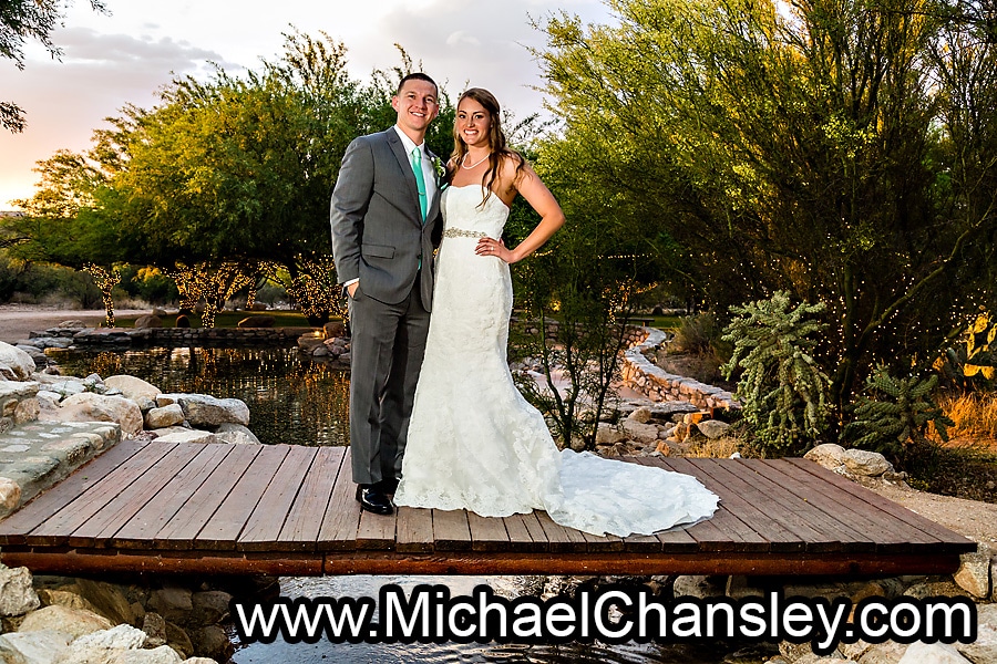 bride and groom on bridge